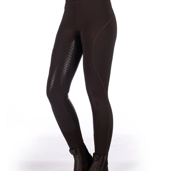 woman wearing HKM Rio Full Seat Riding Tights on white background