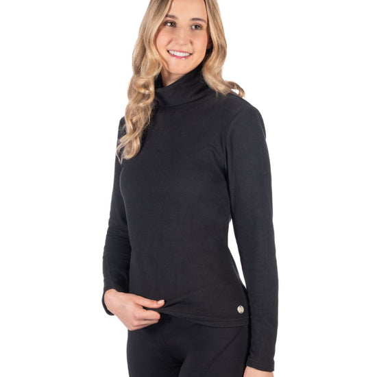 woman wearing HKM black Eva Turtleneck Shirt on white background - equestrian fashion outfitters