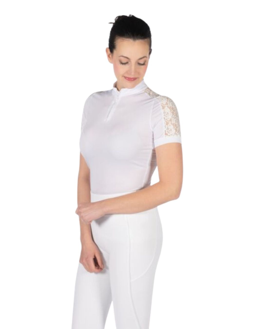 Woman wearing a white equestrian show shirt with lace sleeves on a white background