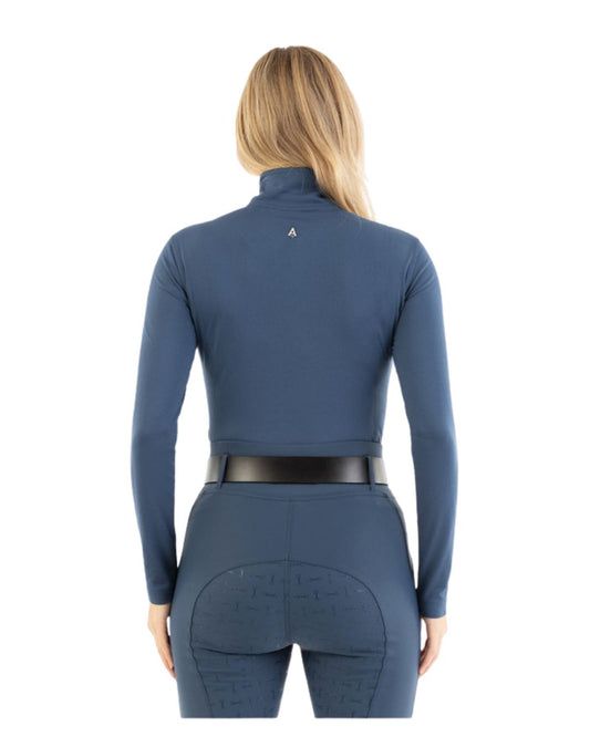 Woman wearing a blue ANKY Zip Pullover Long Sleeve Shirt on a white background