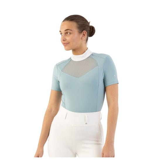 Woman wearing a light blue top with mesh panels BR Koosje on a white background Equestrian Fashion Outfitters