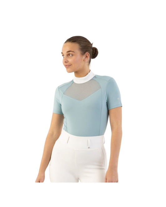 Woman wearing a light blue top with mesh panels BR Koosje on a white background Equestrian Fashion Outfitters