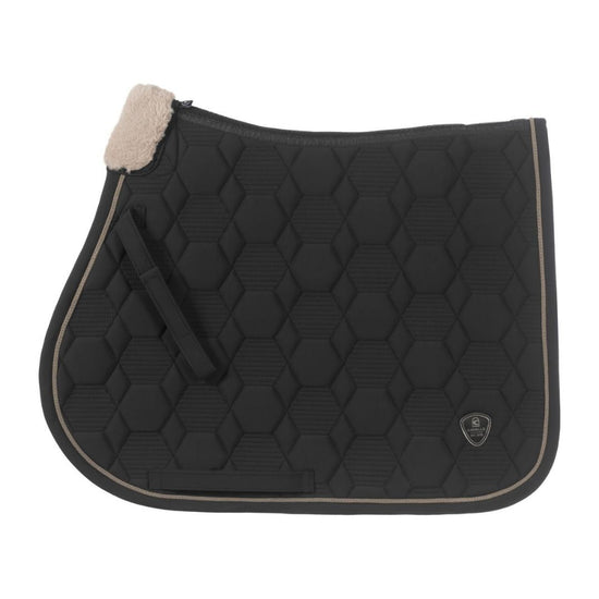 Black quilted jumper saddle pad with beige border on a white background