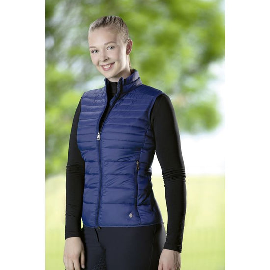 Woman wearing HKM Lena Quilted navy blue Vest with blurred background