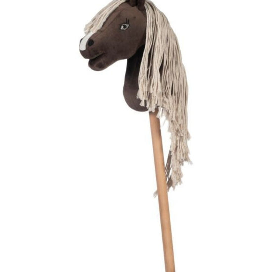 Horse head plush toy on a wooden stick with a white background equestrian fashion outfitters