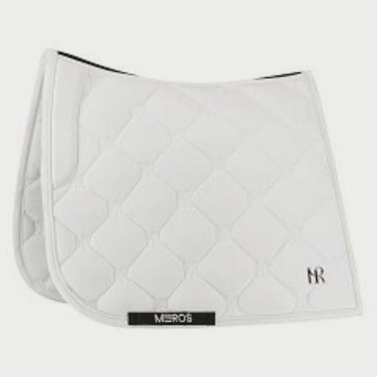 White quilted saddle pad with a brand logo on a white background