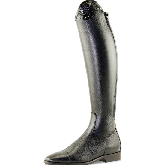 Black riding boot with decorative element on a white background
