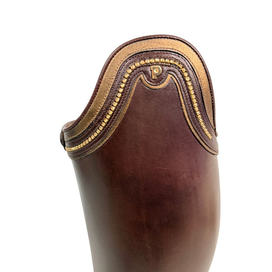 Brown leather boot with gold trim on a white background Petrie equestrian fashion outfitters