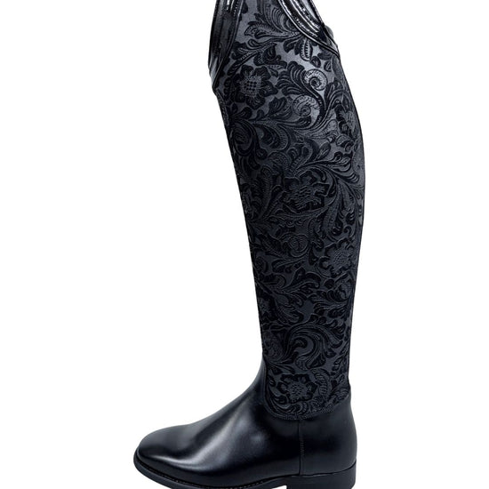 Black riding boot with intricate floral pattern on a white background petrie equestrian fashion outfitters