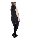 Woman wearing a Black HKM Canada Heated Vest and a light gray long-sleeve shirt on a white background