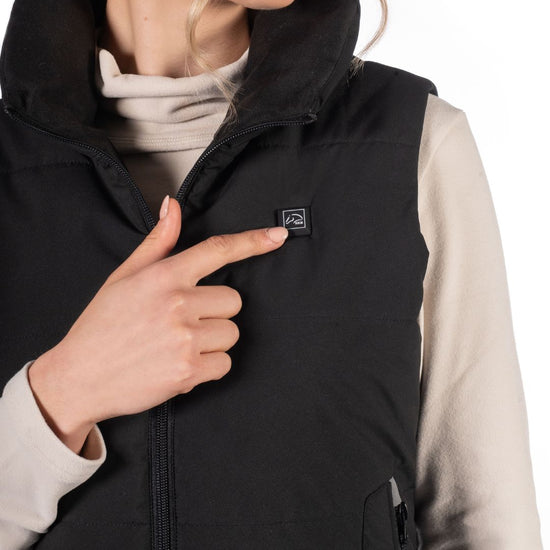 close up of Woman wearing a Black HKM Canada Heated Vest on a white background