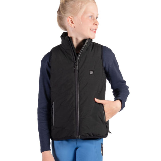 Child wearing HKM Childrens Black heated vest with logo on a white background equestrian fashion outfitters