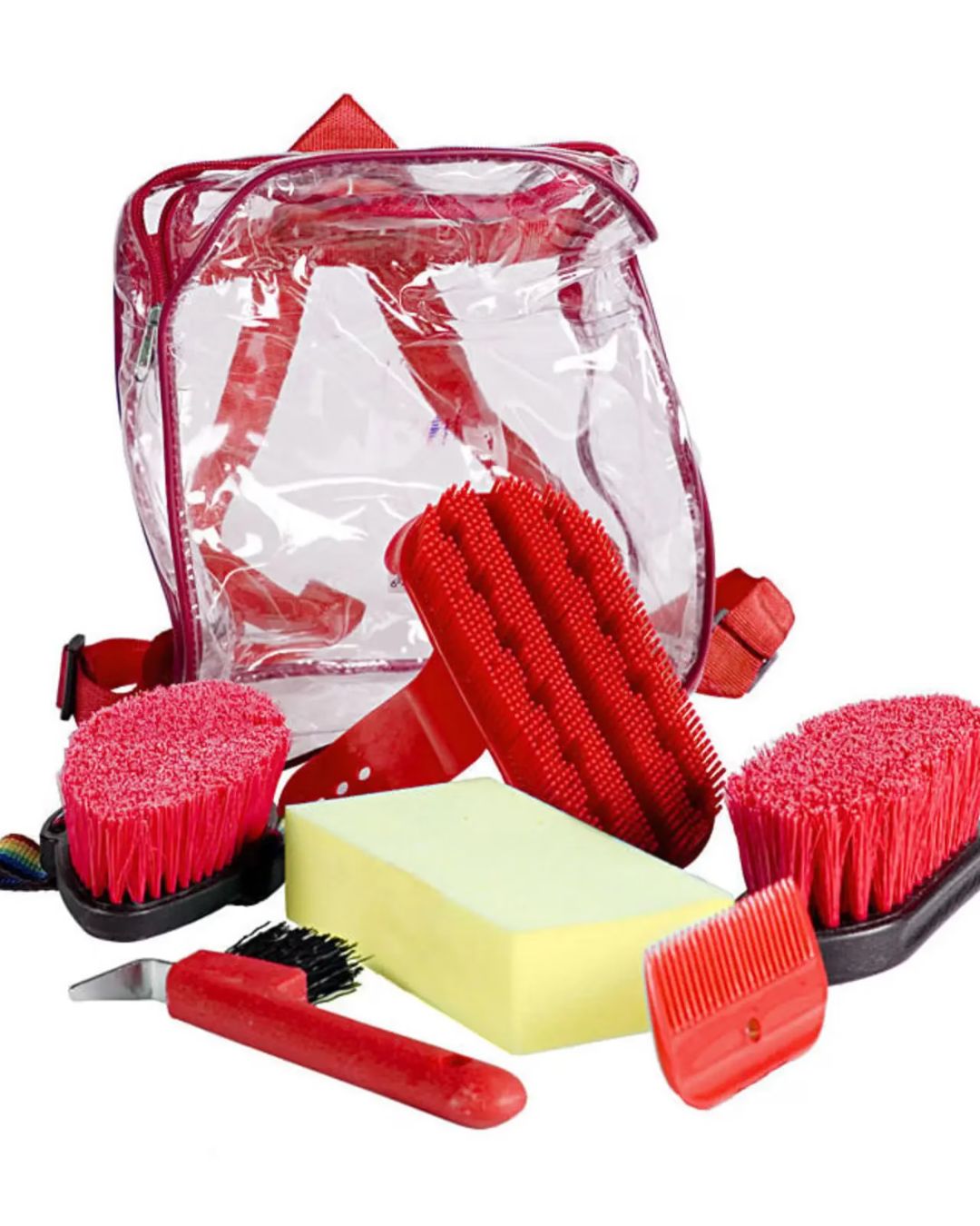 Set of red grooming brushes, sponges, and a clear bag on a white background