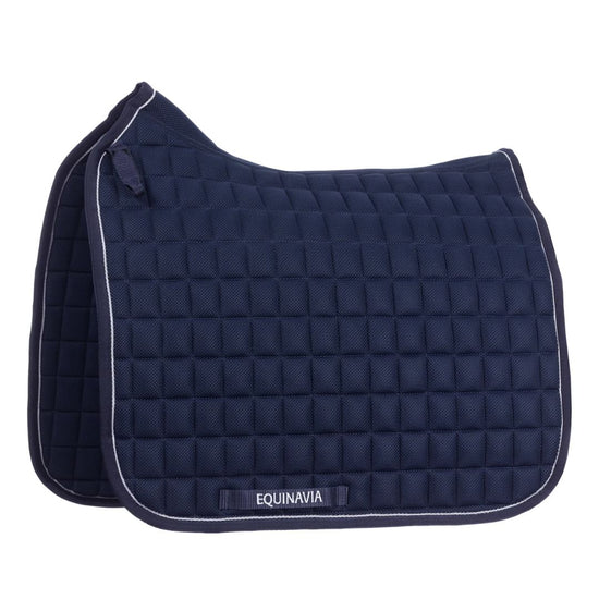 Navy blue quilted saddle pad with 'Equinavia' branding on a white background