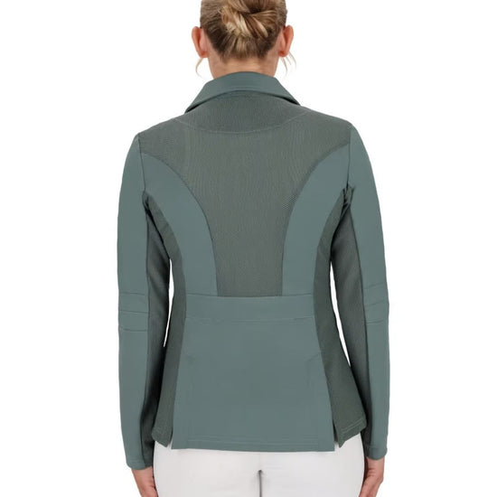 Person wearing a green equestrian jacket on a white background equestrian fashion outfitters