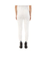 White riding pants worn by a person on a white background equestrian fashion outfitters