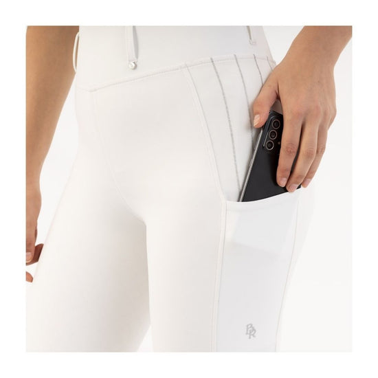 White riding pants worn by a person on a white background equestrian fashion outfitters