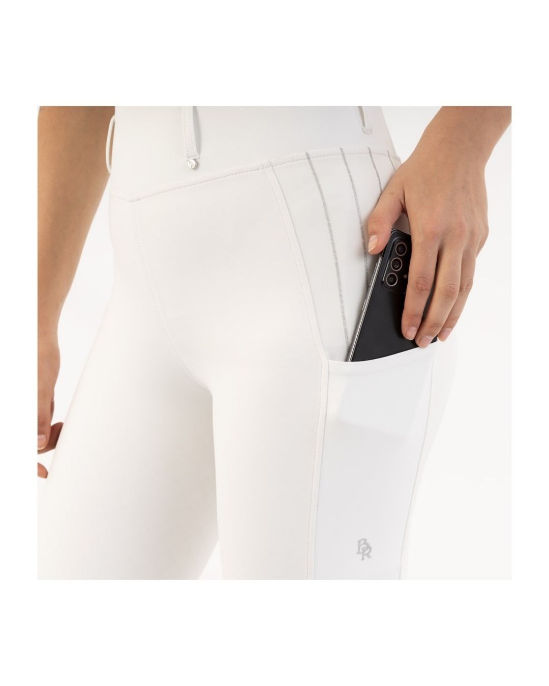 White riding pants worn by a person on a white background equestrian fashion outfitters