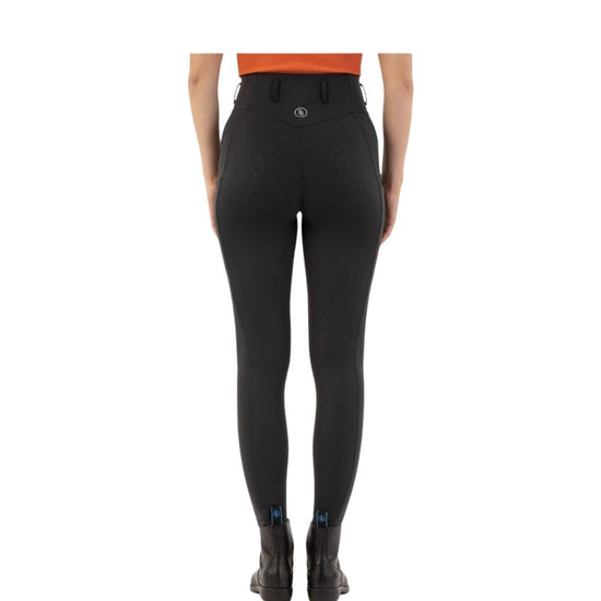 Black riding pants worn by a person on a white background equestrian fashion outfitters