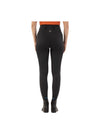 Black riding pants worn by a person on a white background equestrian fashion outfitters
