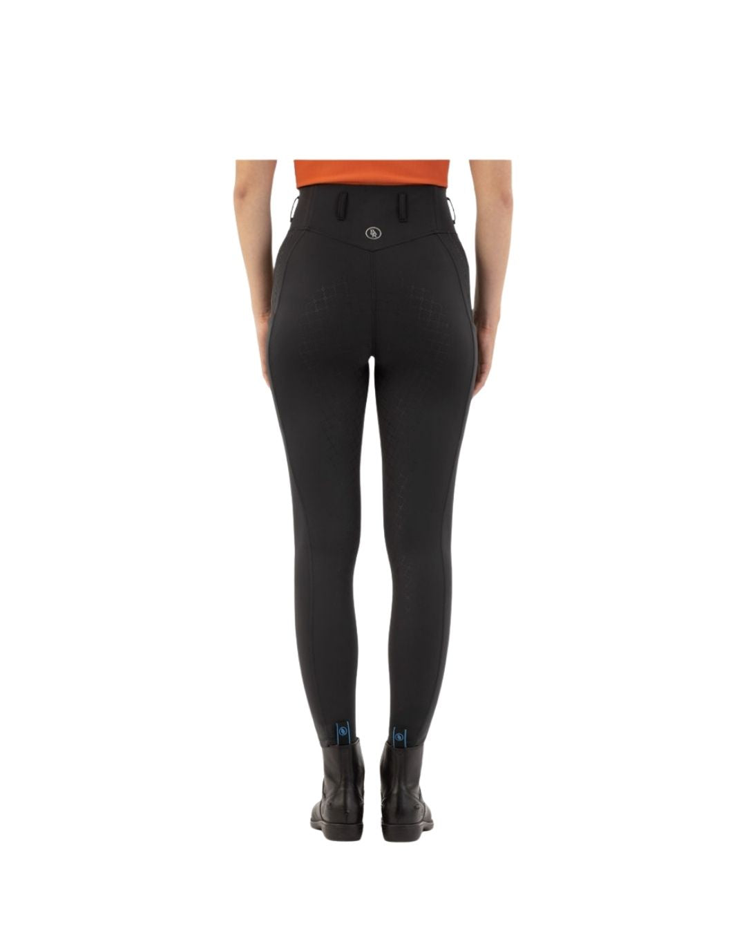 Black riding pants worn by a person on a white background equestrian fashion outfitters