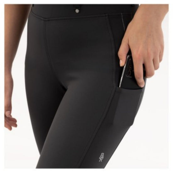 Black riding pants worn by a person on a white background equestrian fashion outfitters
