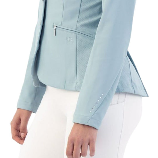 Woman wearing a light blue blazer show jacket Kendra on a white background equestrian Fashion Outfitters