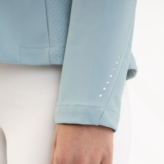 Woman wearing a light blue blazer show jacket Kendra on a white background equestrian Fashion Outfitters