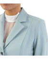 Woman wearing a light blue blazer show jacket Kendra on a white background equestrian Fashion Outfitters