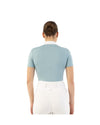 Woman wearing a light blue top with mesh panels BR Koosje on a white background Equestrian Fashion Outfitters