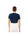 Woman wearing a navy equestrian shirt with a white collar and mesh detail BR Koosje on a white background equestrian fashion outfitters