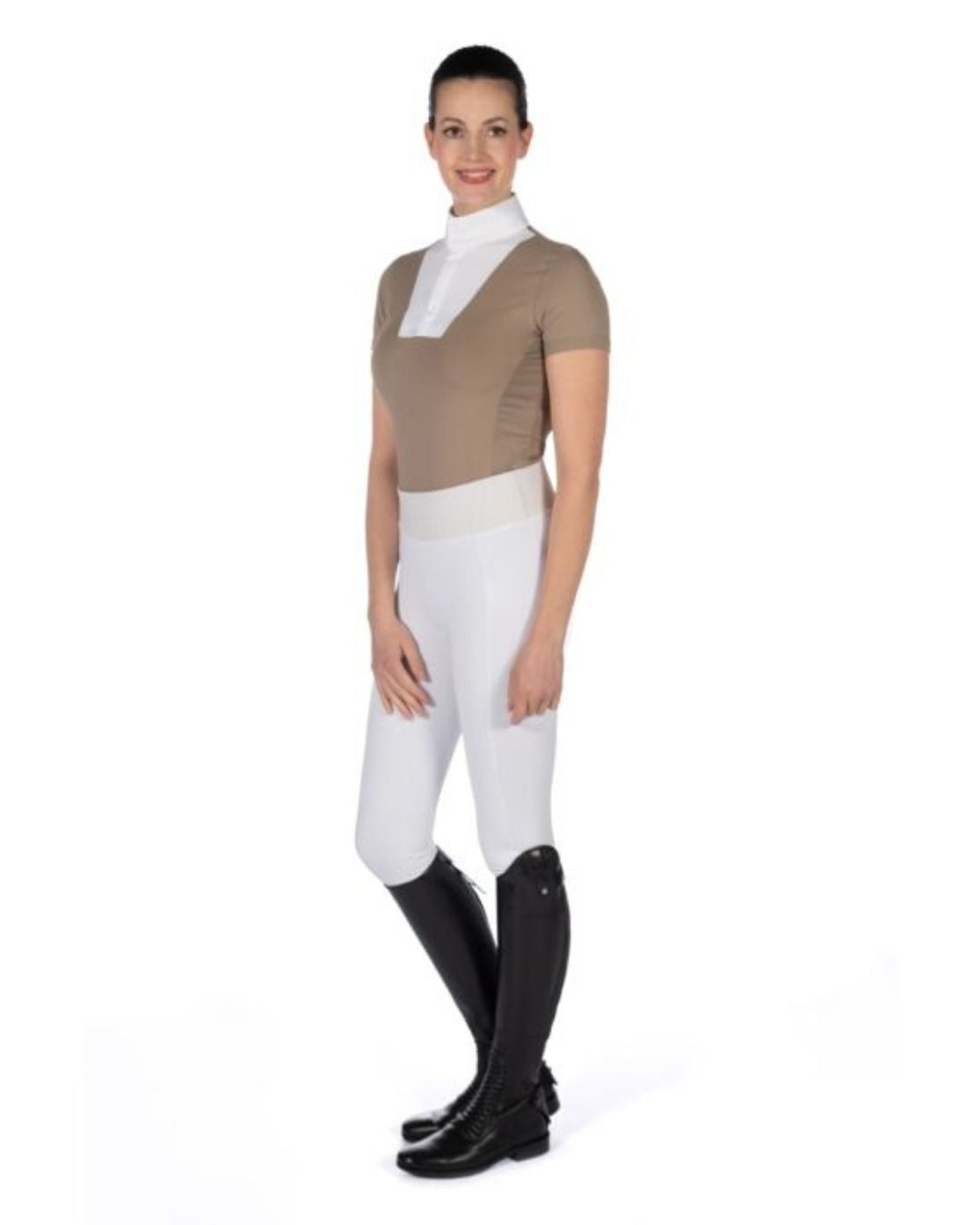 Woman wearing a brown top, white pants, and black riding boots on a white background Equestrian fashion outfitters