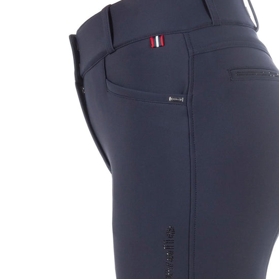 Navy riding pants with a brand logo on a white background