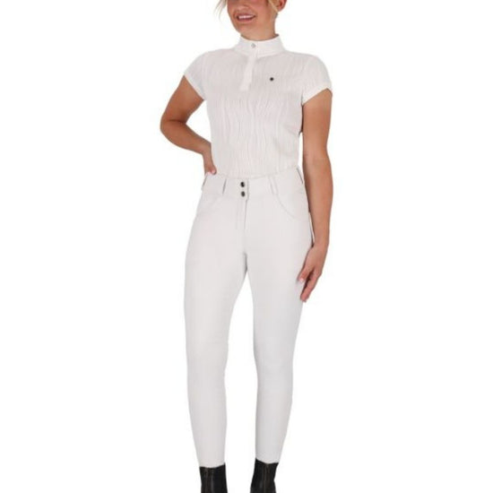 Woman wearing a white e qhp kynlee short sleeve shirt  equestrian fashion outfitters