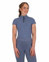 Woman wearing a blue qhp short sleeve training shirt on a white background equestrian fashion outfitters