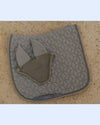 Quilted saddle pad with a ear bonnet on a beige  khaki background