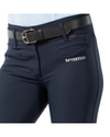 Close-up of navy blue equestrian riding breeches with a black leather belt, featuring the B/VERTIGO logo embroidered in white on the side pocket. equestrian fashion outfitters