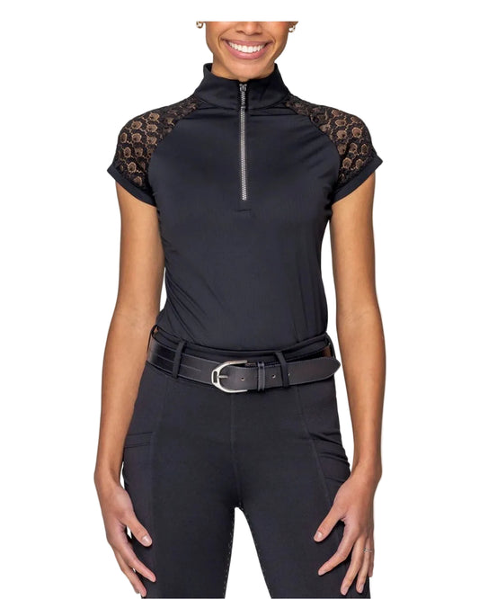 Woman wearing a black equestrian outfit with lace sleeves on a white background kastel equestrian fashion outfitters