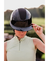 Girl with black shiny glossy helmet with black sparkle diamond top panel equestrian fashion outfitters