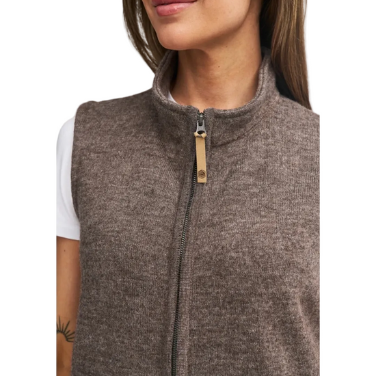 brown wool vest with zipper and leather tie and white tshirt equestrian fashion outfiters