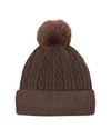 A brown cable-knit beanie hat with a matching faux-fur pom-pom on top and a ribbed cuff decorated with small multicolored glitter specks, shown against a plain white background. equestrian fashion outfitters