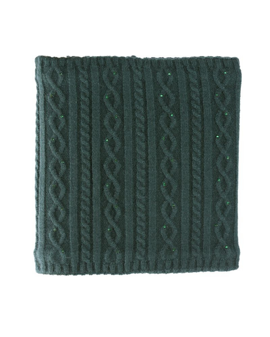 A square dark green cable-knit fabric accessory, a scarf or snood or neck warmer featuring vertical and diagonal cable patterns with small green glitter accents, shown on a plain white background. equestrian fashion outfitters