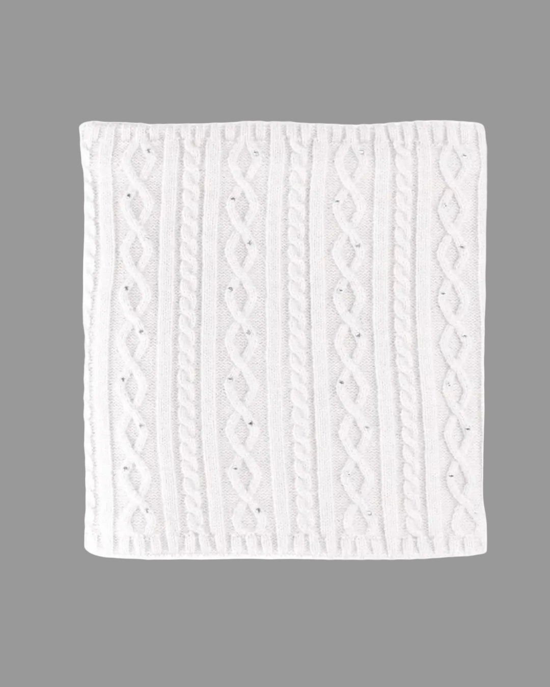 A square white knit snood or small scarf, featuring vertical cable and twisted knit patterns on a solid white background with sequins equestrian fashion outfitters