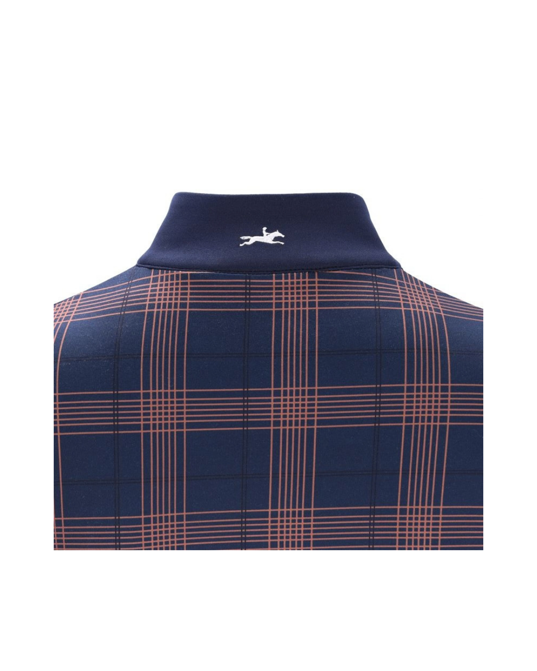 A close-up of a navy blue knit collar with a small white embroidered horse logo, set against a matching navy and peach plaid fabric. equestrian fashion outfitters