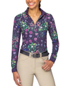 Woman wearing a floral-patterned long-sleeve shirt with a white background equestrian fashion outfitters